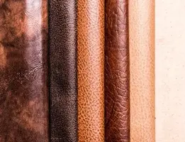 Rolls of premium leather in brown and tan tones